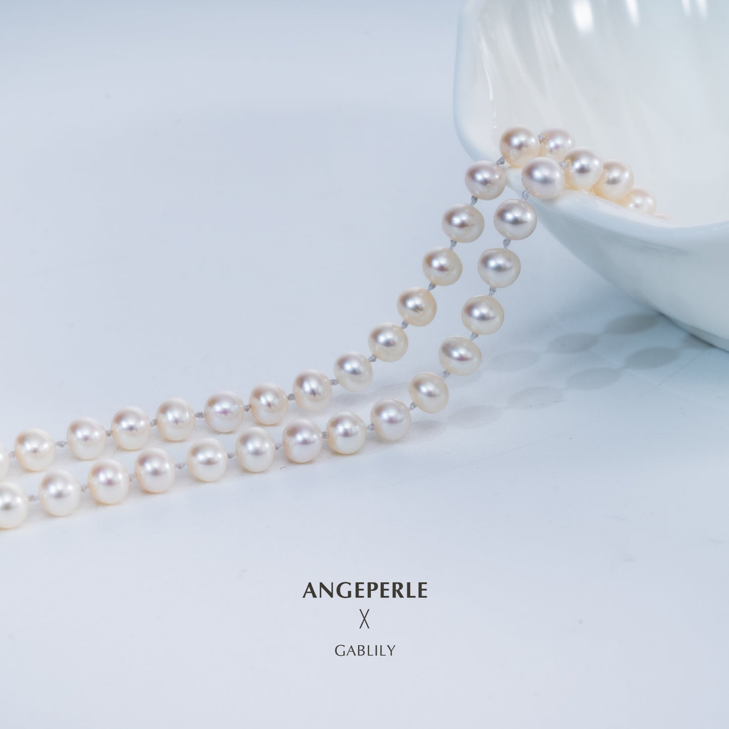 5.5-6.5mm White Cultured Freshwater Pearl Necklace with OT Clasp in S925 Sterling Silver